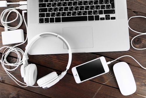 Computer,Peripherals,And,Laptop,Accessories,On,Wooden,Background